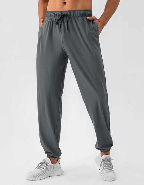 Load image into Gallery viewer, Men&#39;s Nylon Cool Feeling Loose Track Pants Quick-drying
